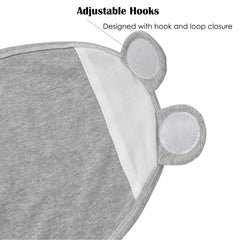 Exemaba swaddle wrap on newborn demonstrates adjustable fit for growing babies.