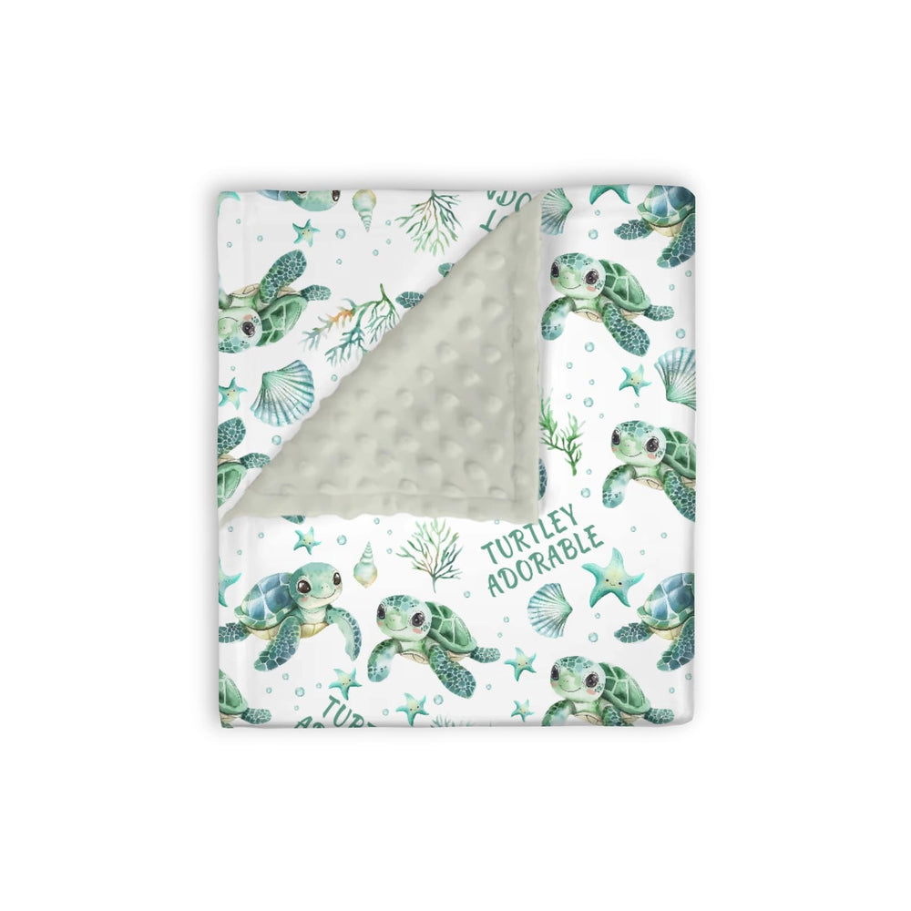 EyMzcod sea turtle mink blanket closeup showing ultra-soft warmth for newborns.
