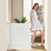 EZIGO 55in retractable gate in white fits a large opening for safe play areas.