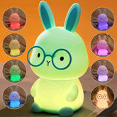 FAMIDUO Bunny Night Light on table offers soft guidance for bedtime
