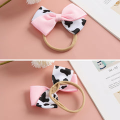 Fancheer cow print bow size 4x3 inch, perfect fit.