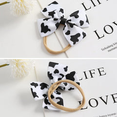 Fancheer cowprint bow headband features soft elastic band for comfortable wear