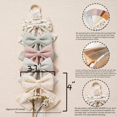 Fancy Clouds 5-inch flower-print embroidered bow close-up for adorable party styling.