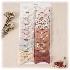 Fancy Clouds baby hair clips with handmade wrapping present a gift-ready look.