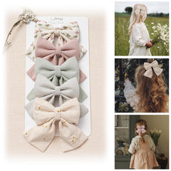 Fancy Clouds 5-piece bow set with clips for stylish everyday outfits.