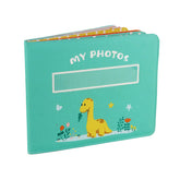 Fanna baby-first photo album cover with dinosaur theme showing soft fabric for gentle use.