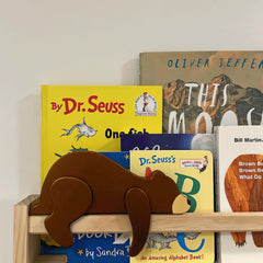 Fcimu bear decor brown wood texture enhances playroom or classroom ambiance.