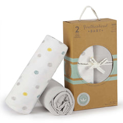 Featherhead cotton closeup, 100% cotton fabric texture for ultra-soft baby skin.