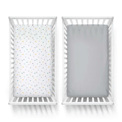 Featherhead 2-pack fitted crib sheets showing elastic edge detail, ensuring tight corners.