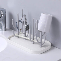 FEOOWV bottle-drying rack holds up to 16 bottles for easy organization.