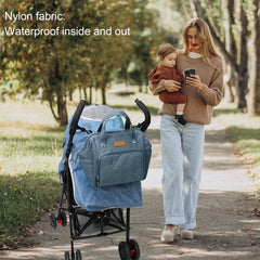FHELAD small diaper bag backpack insulated pocket keeps bottles ready on trips.