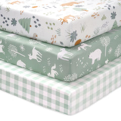 FIEMOL Green Forest Bear sheets folded showing ultra-soft microfiber texture for gentle baby skin