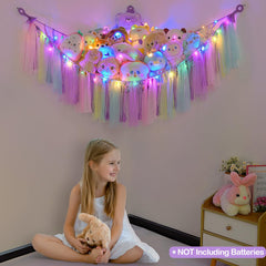 FIOBEE hanging stuffed animals hammock shown in a wide room shot for display.