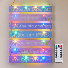 FIOBEE purple-butterfly-led-wall-art-1 glows softly, ideal as a comforting night-light in a teen room.