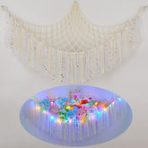 FIOBEE stuffed animals hammock with LED light in nursery for cozy organization.