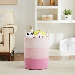 Fiona's magic pink collapsible cotton rope laundry hamper demonstrates space-saving design for small rooms.