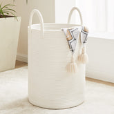 Fiona's magic white woven rope laundry basket 58L tall stores blankets and clothes with easy access.