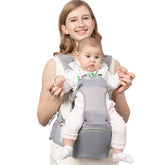 Fisca baby-carrier front view inward-facing shows ergonomic comfort for parent and infant.