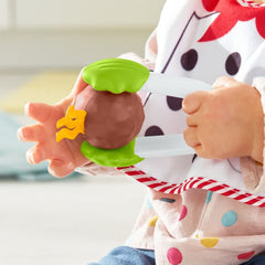 Fisher-Price Cutest Chef crinkle recipe card adds tactile sound to pretend cooking.