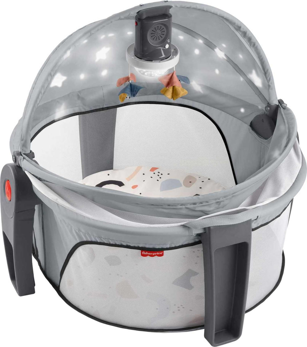 Fisher-Price projection dome mobile with music engages newborns during play and sleep.