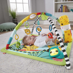 Fisher-Price Rainforest Sensory Gym tummy wedge providing soft support during tummy time