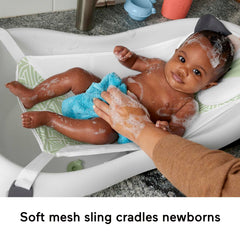 Fisher-Price toddler tub with rinse scoop offers room to splash.