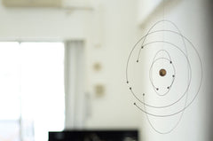 Flensted Niels Bohr Atom Mobile 9in steel suspended view showcases graceful motion in any room.