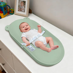 FLEUFAB baby changing pad top view showing compact dresser-ready design for easy setup