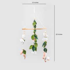 Flora & Ivy butterfly mobile green leaves add natural whimsy to a nature-themed nursery.