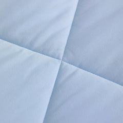 FLXXIE flat-sheet closeup highlights generous dimensions for easy bed prep