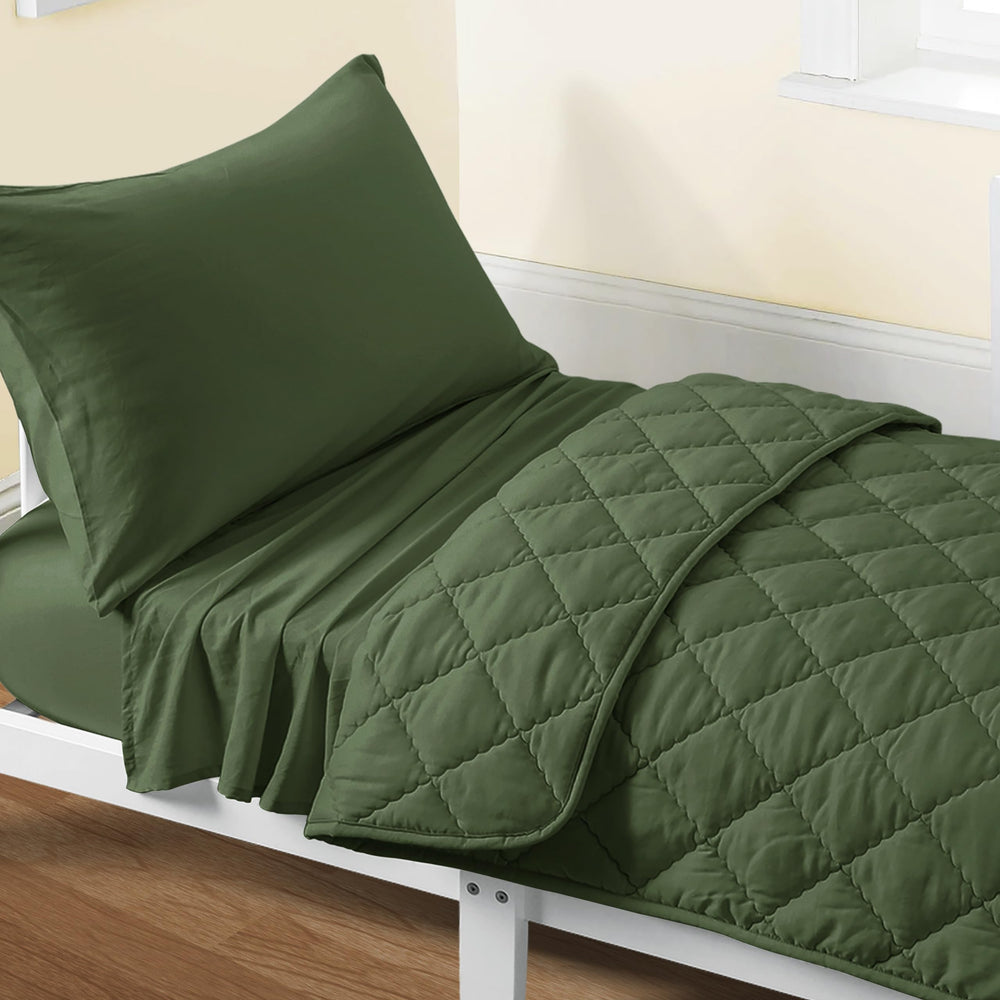 FLXXIE toddler olive quilt close-up showing soft microfiber stitching for durable comfort