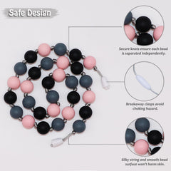 Flyaway chew necklaces shown with cleaning essentials, highlighting easy soap-and-water cleanup.