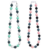 Flyaway chew necklaces displaying safe material, soft silicone beads for sensory comfort and focus.