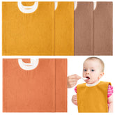 Foaincore pullover baby bib in soft cotton for gentle skin protection during feeding.