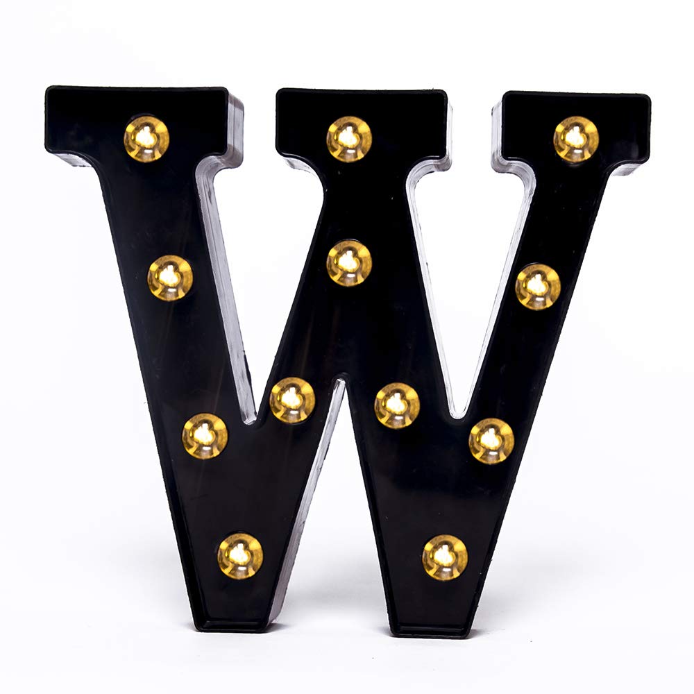 Foaky black LED marquee number lights sign close-up showing decorative glow for table decor