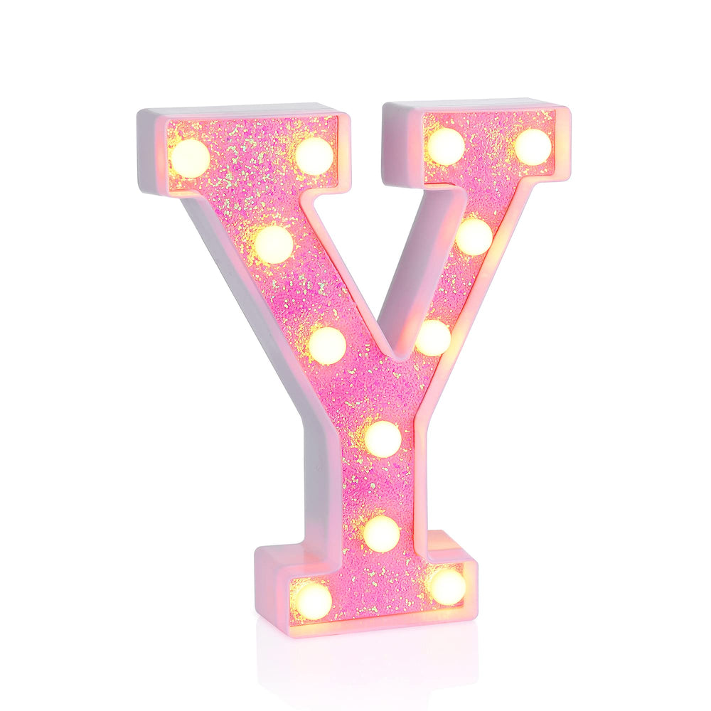 Foaky pink light up letters closeup showing glitter finish and glow