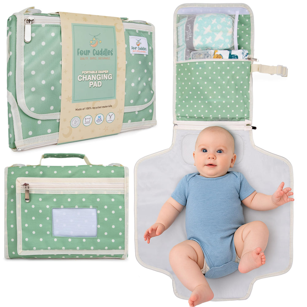Four Cuddles portable changing pad with extended wings provides full coverage for on-the-go diaper changes.