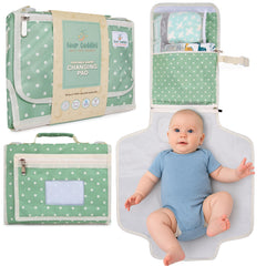 Four Cuddles portable changing pad with extended wings provides full coverage for on-the-go diaper changes.