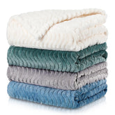 Frienda baby fuzzy blanket in cream color provides cozy warmth for newborns.