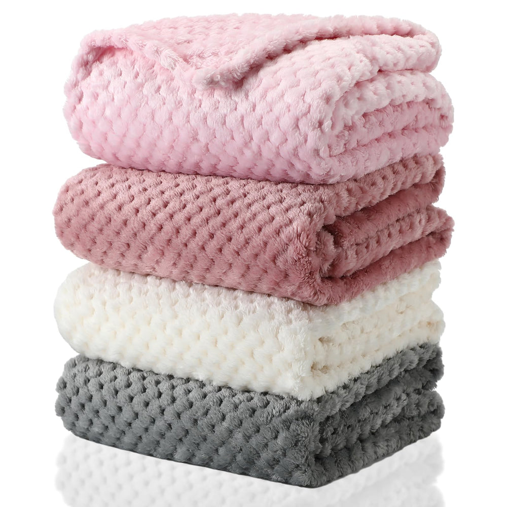 Frienda baby fuzzy blanket folded-compact for space-saving storage and travel warmth.