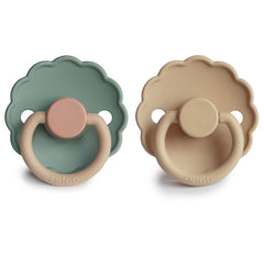 Frigg Daisy pacifier in baby's mouth during a calming moment.