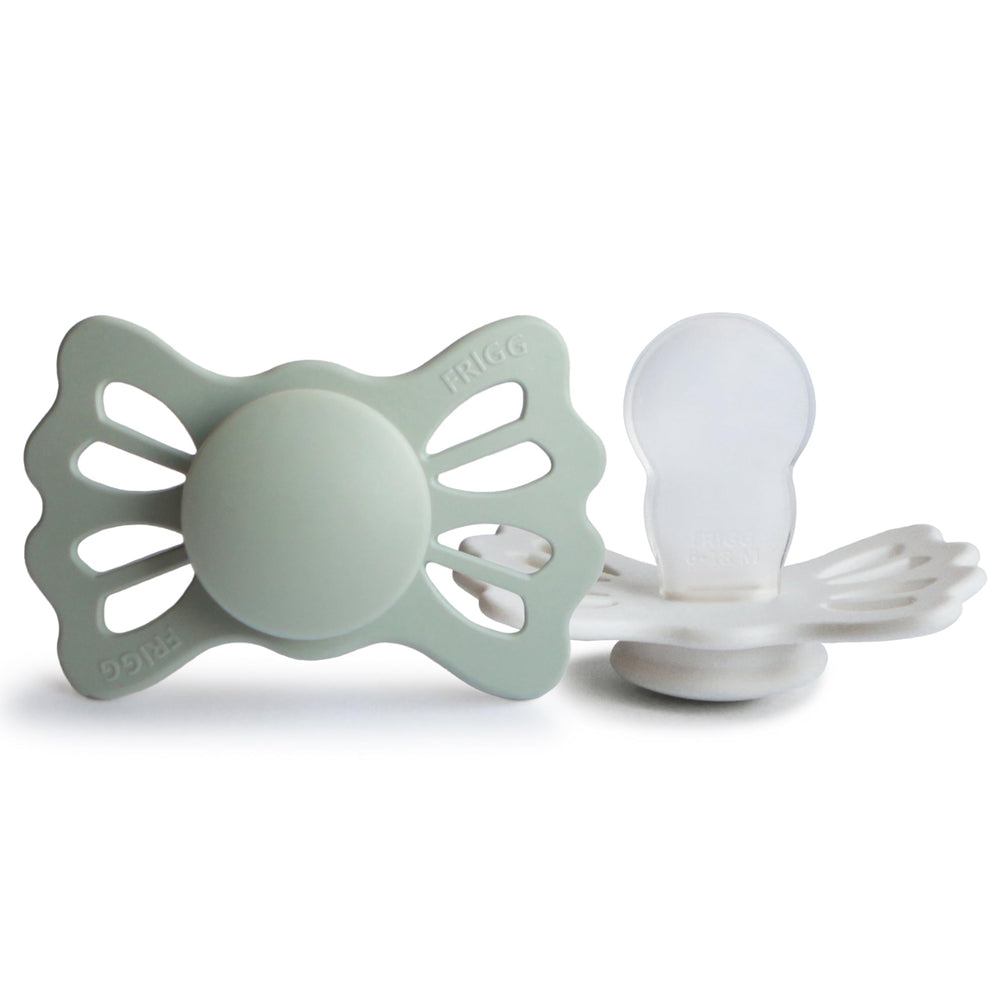 Frigg Lucky symmetrical pacifier close-up showing comfortable fit for baby