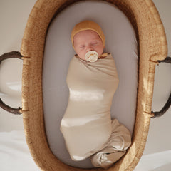 FRIGG rope pacifier side view showing ergonomic shield for skin comfort.
