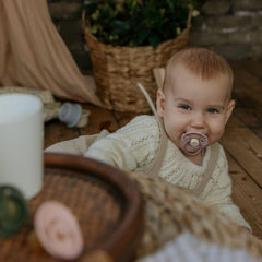 FRIGG SilkySoft pacifier air holes support breathability and comfort.