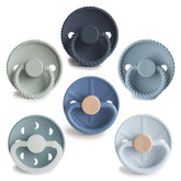 FRIGG SilkySoft pacifier nipple close-up showing silky-soft silicone for gentle soothing.