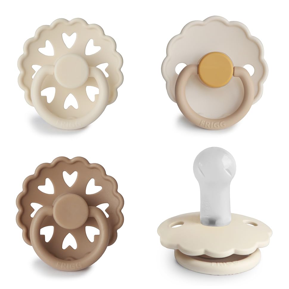 FRIGG SilkySoft pacifier Snowflake Dream close-up shows gentle silicone nipple for soothing comfort.