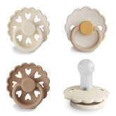 FRIGG SilkySoft pacifier Snowflake Dream close-up shows gentle silicone nipple for soothing comfort.