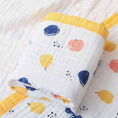 Fruit Muslin Baby Blanket nursery-prop demonstrates breathable cotton for little ones.
