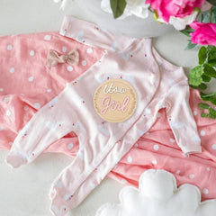 FUTNH baby shower prop in pink wood circle, adds memorable decor touch.