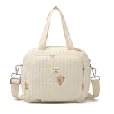Fwkekye small diaper bag tote front pocket for quick-access baby essentials on the go.